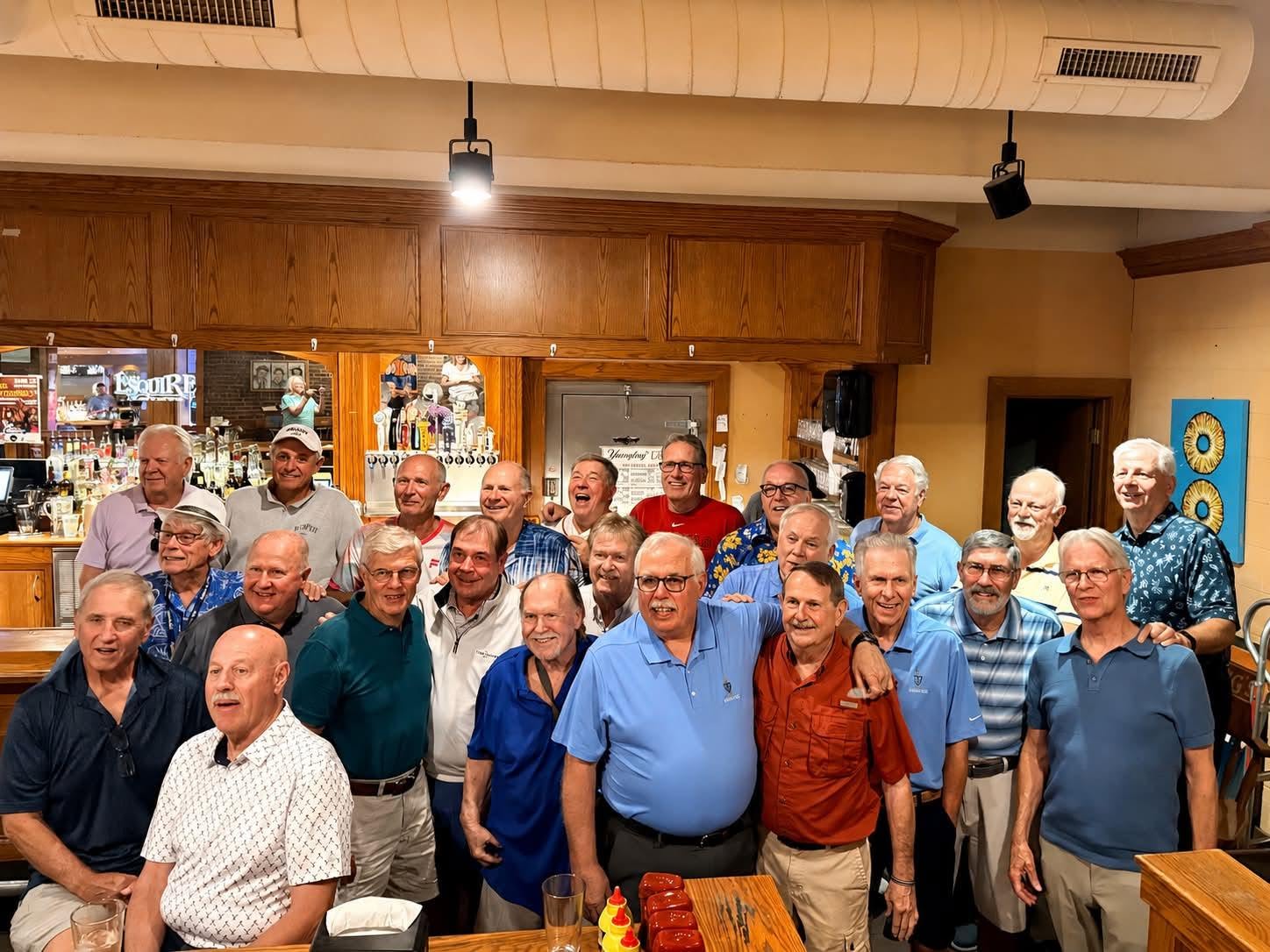 Group photo of Eta Mu alumni gathered together in 2026
